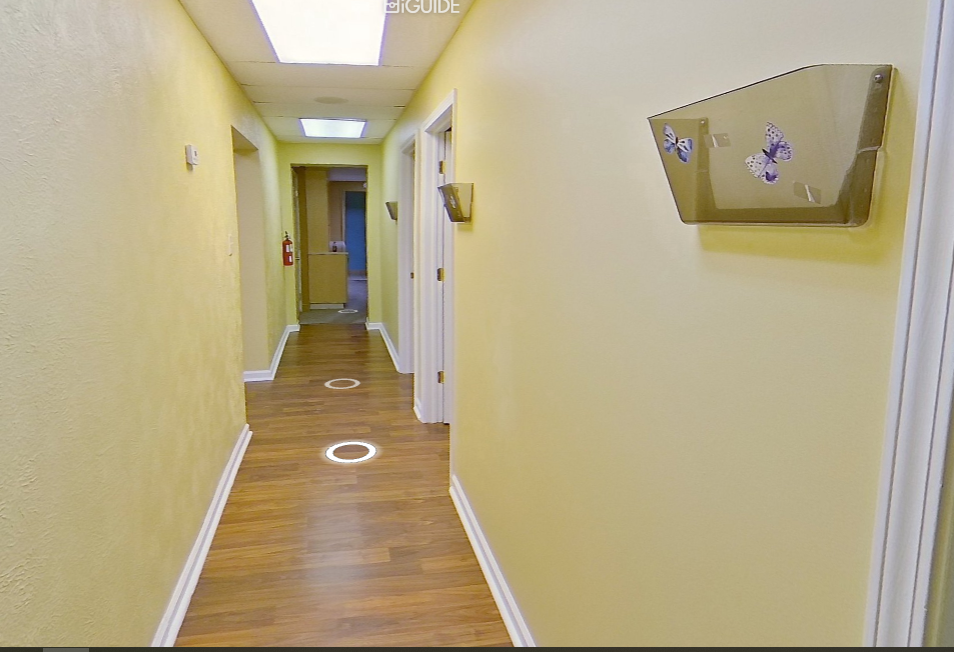 Interior hallway serving multiple private offices